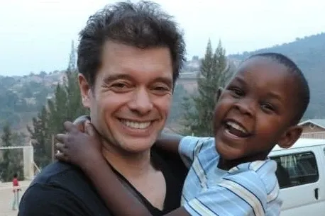 Michael Stromme with Angie in Rwanda