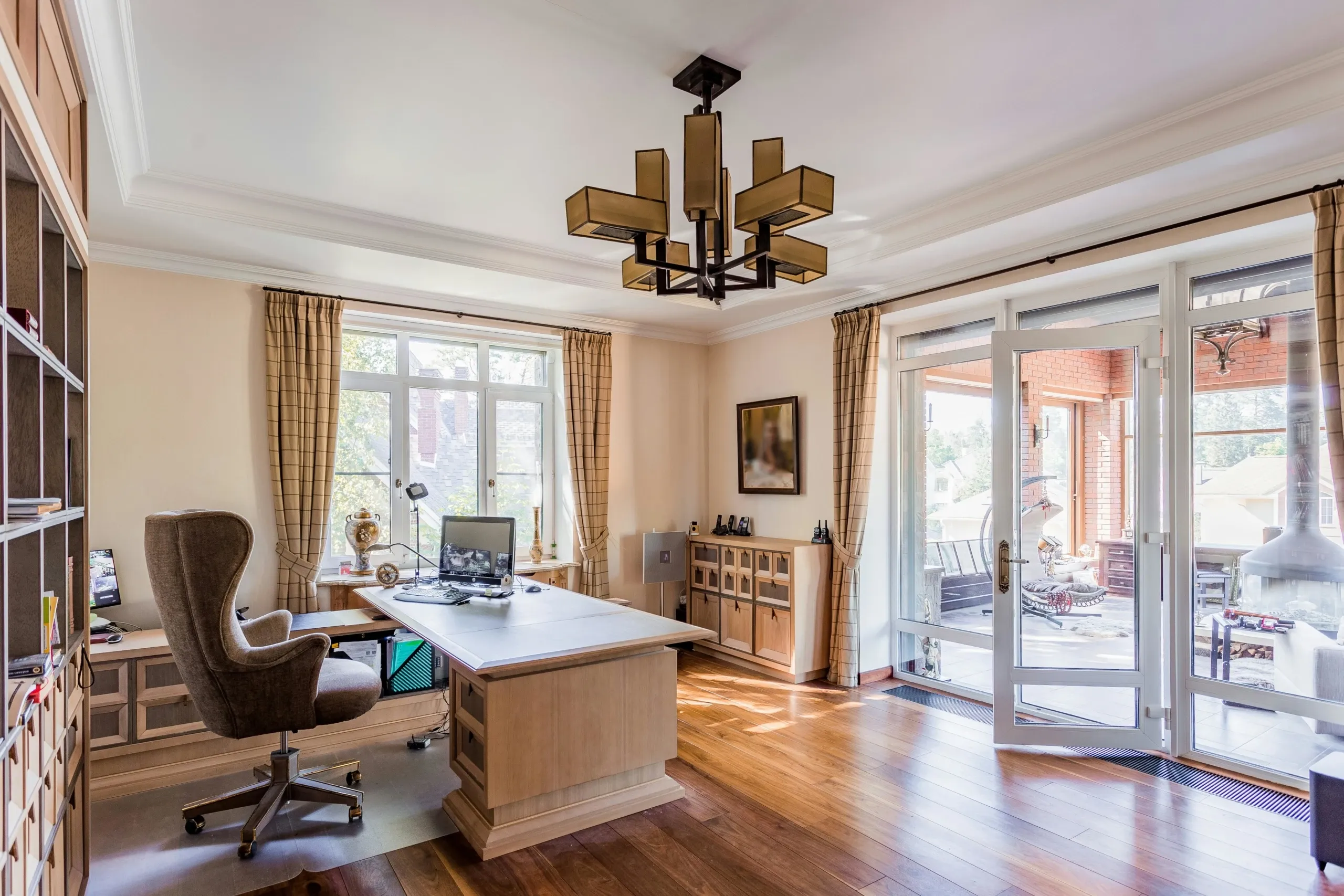 home office with chair and desk; Photo by Алан Албегов