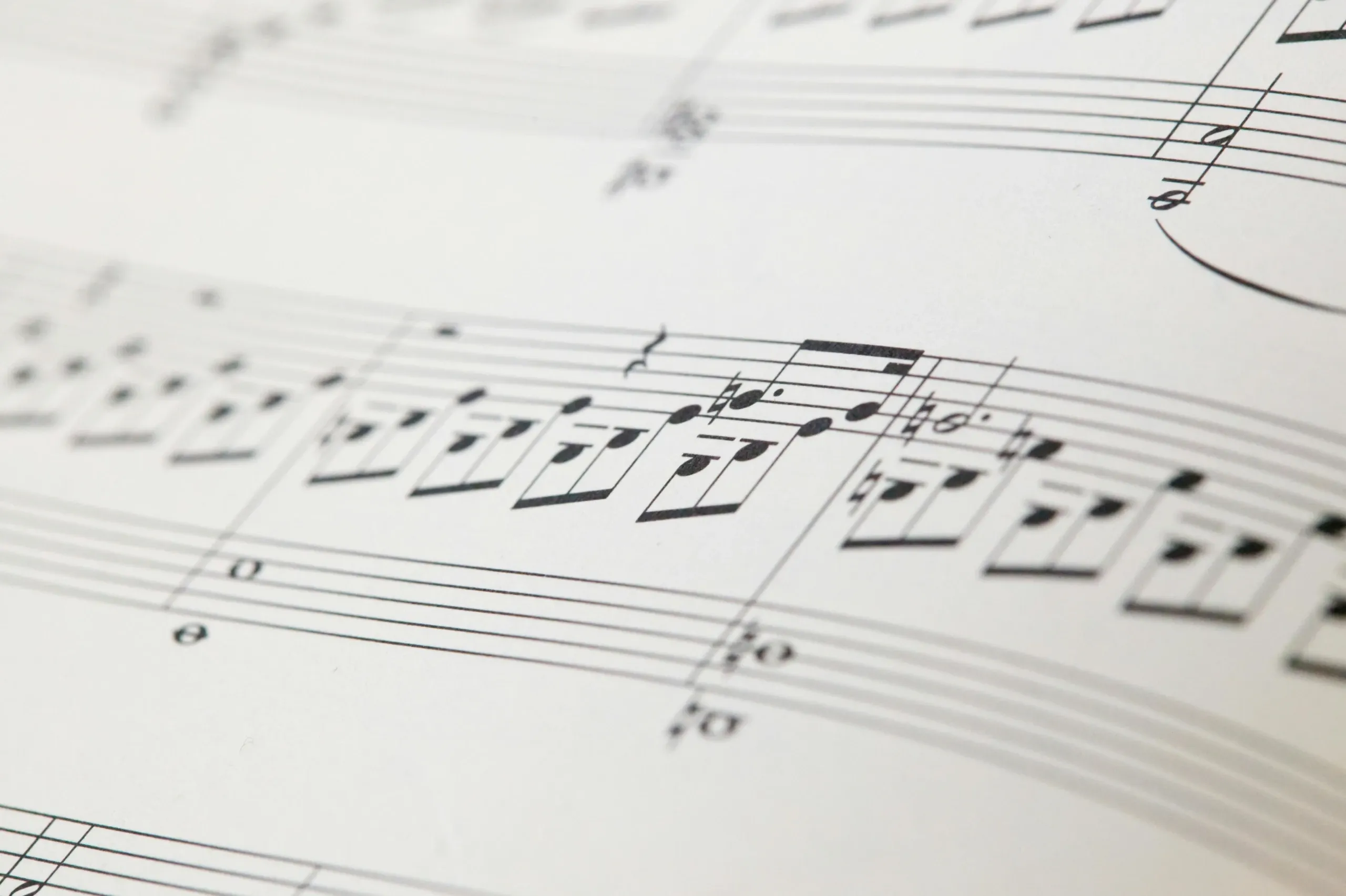 musical notes on paper; Photo by César Guillotel